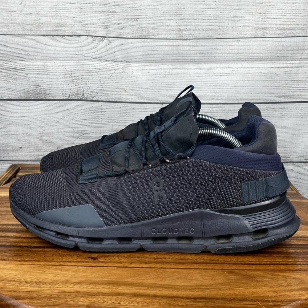 On Running Black and Blue Athletic Shoes Sleek Design